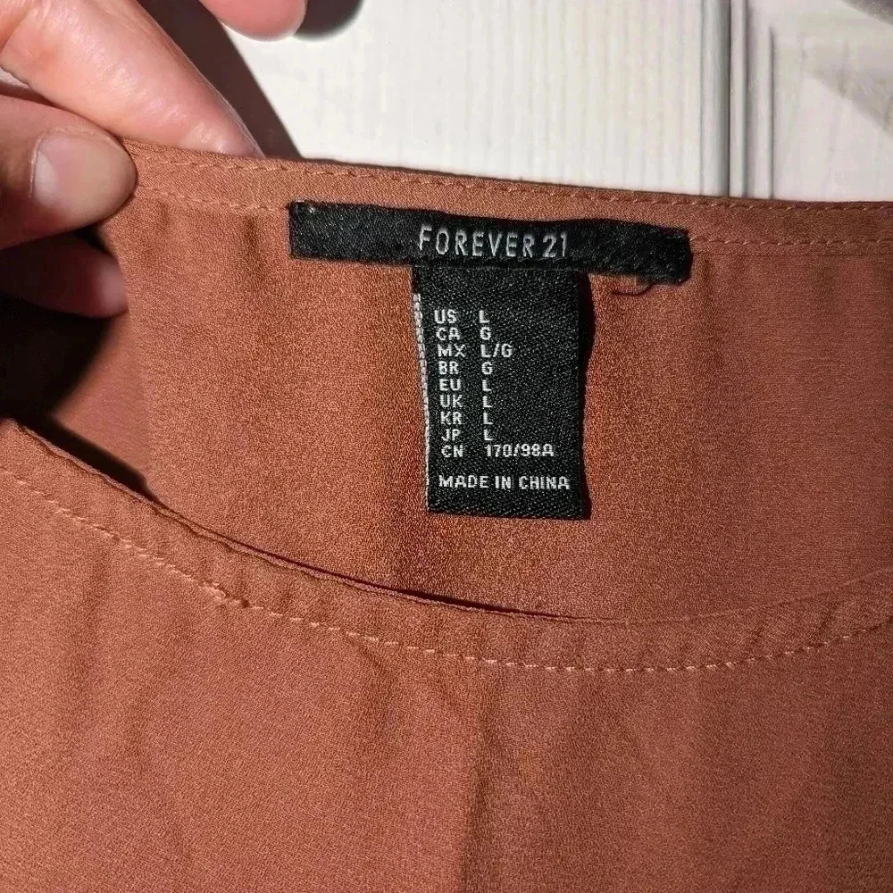 Women's terracotta top. Size L